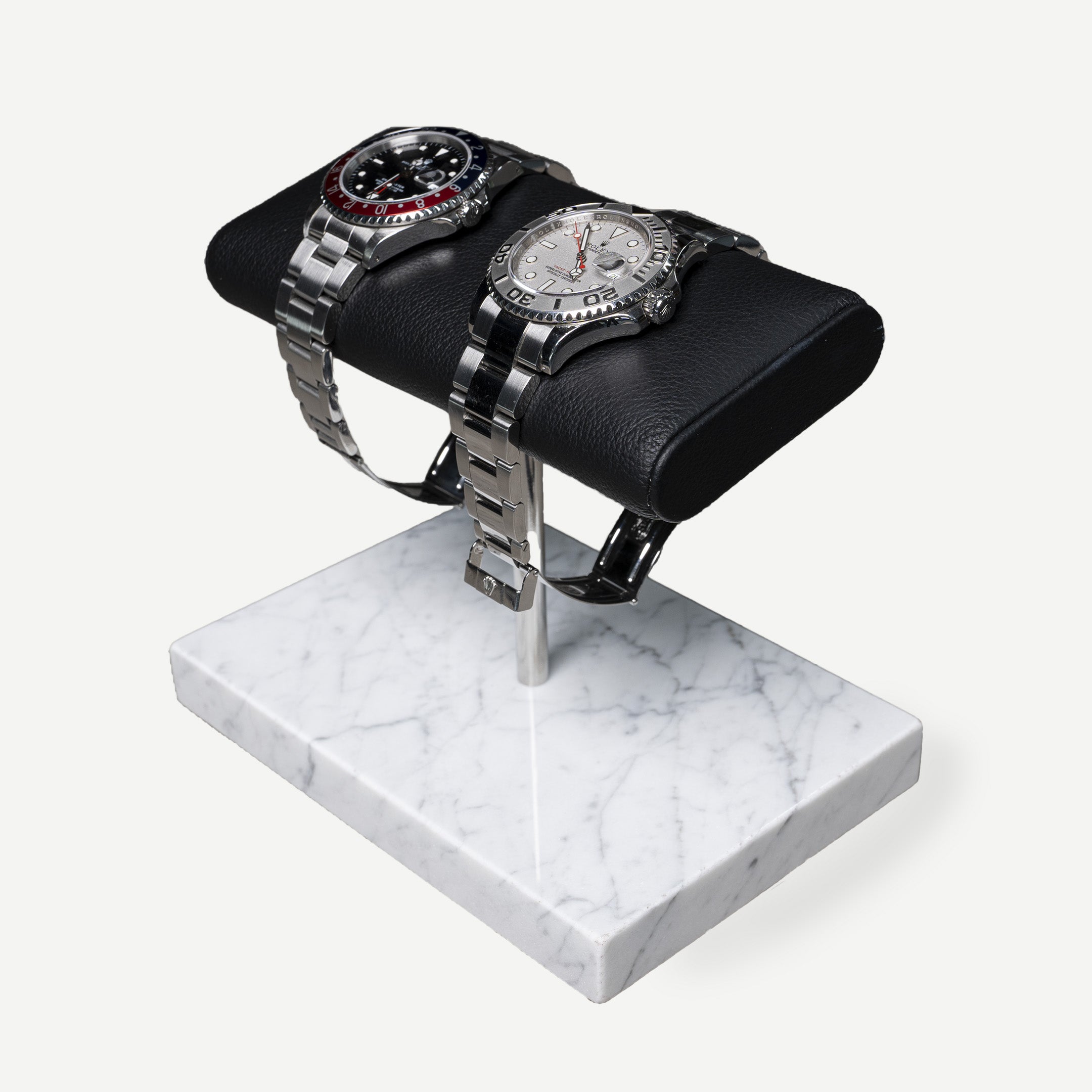 the watch stand duo, white marble, silver details, black cusion, italian calfskin leather, white carrara marble base plate, watch display, how to display your watches, display for two watches
