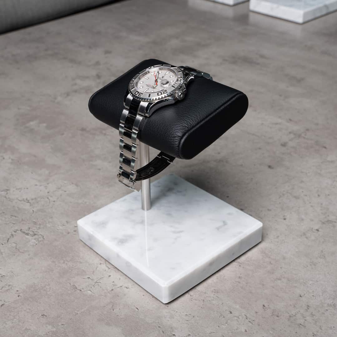 watch stand white marble black cusion, italian calfskin leather, carrara marble base plate, watch display, how to display your watches, watch stand scenery